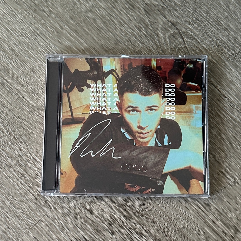 What a Man Gotta Do Signed Album- Nick Jonas